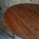 Antique round dining table in cherry wood, France, circa 1920.