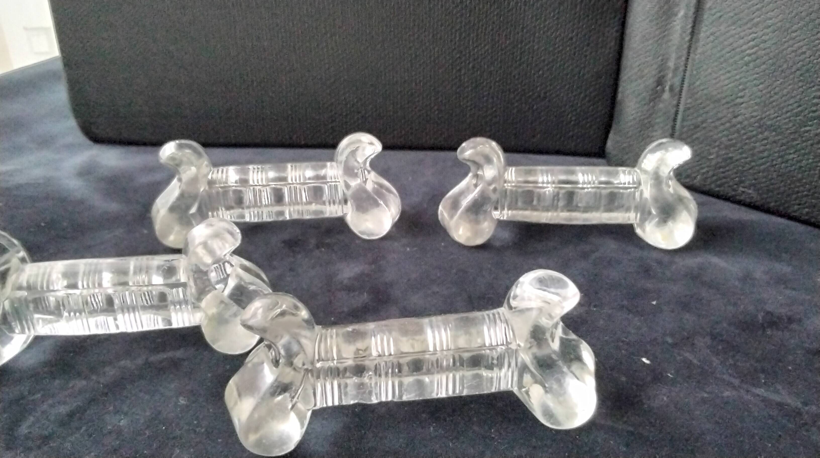 4 large pressed moulded glass knife rests