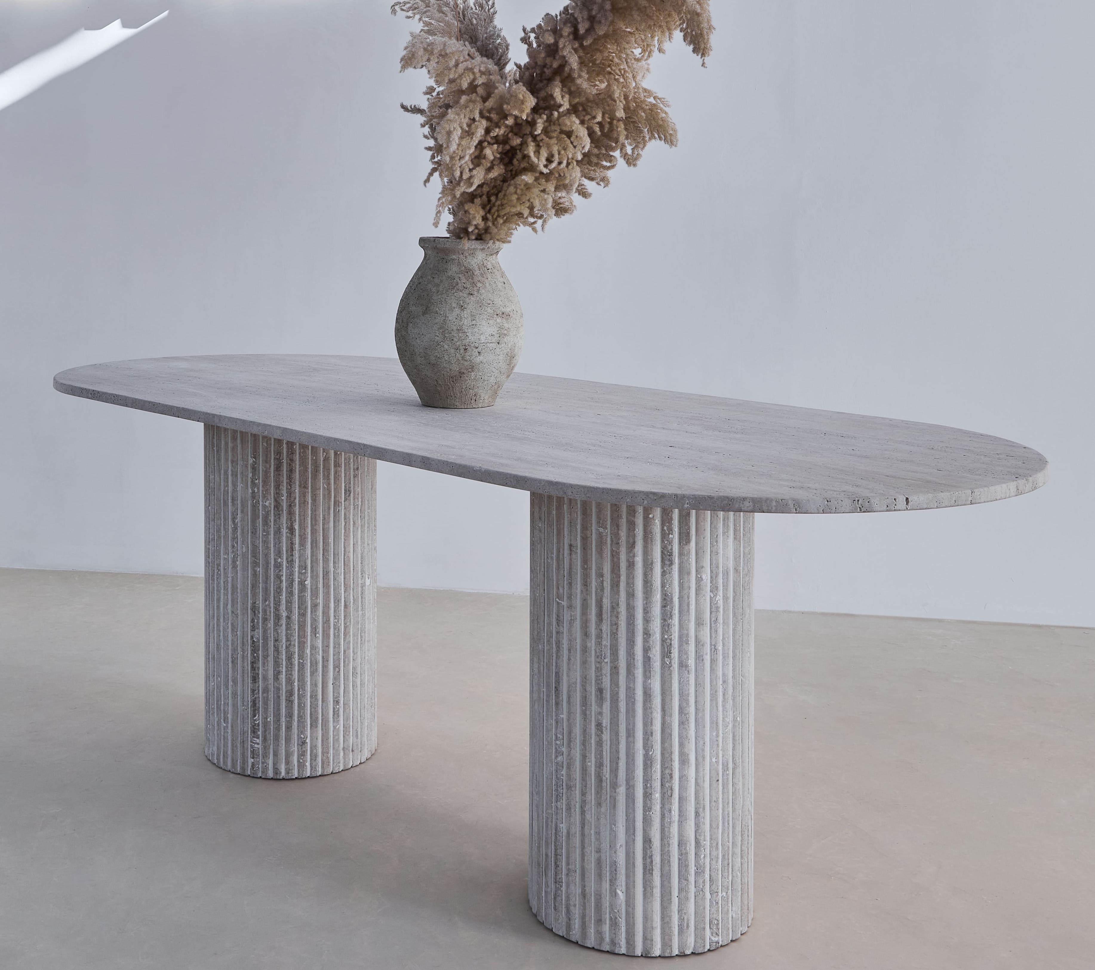 Olya oblong dining table 150x90 in natural travertine