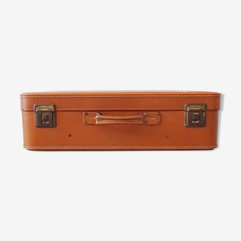 Valise de couleur cognac, valise dure