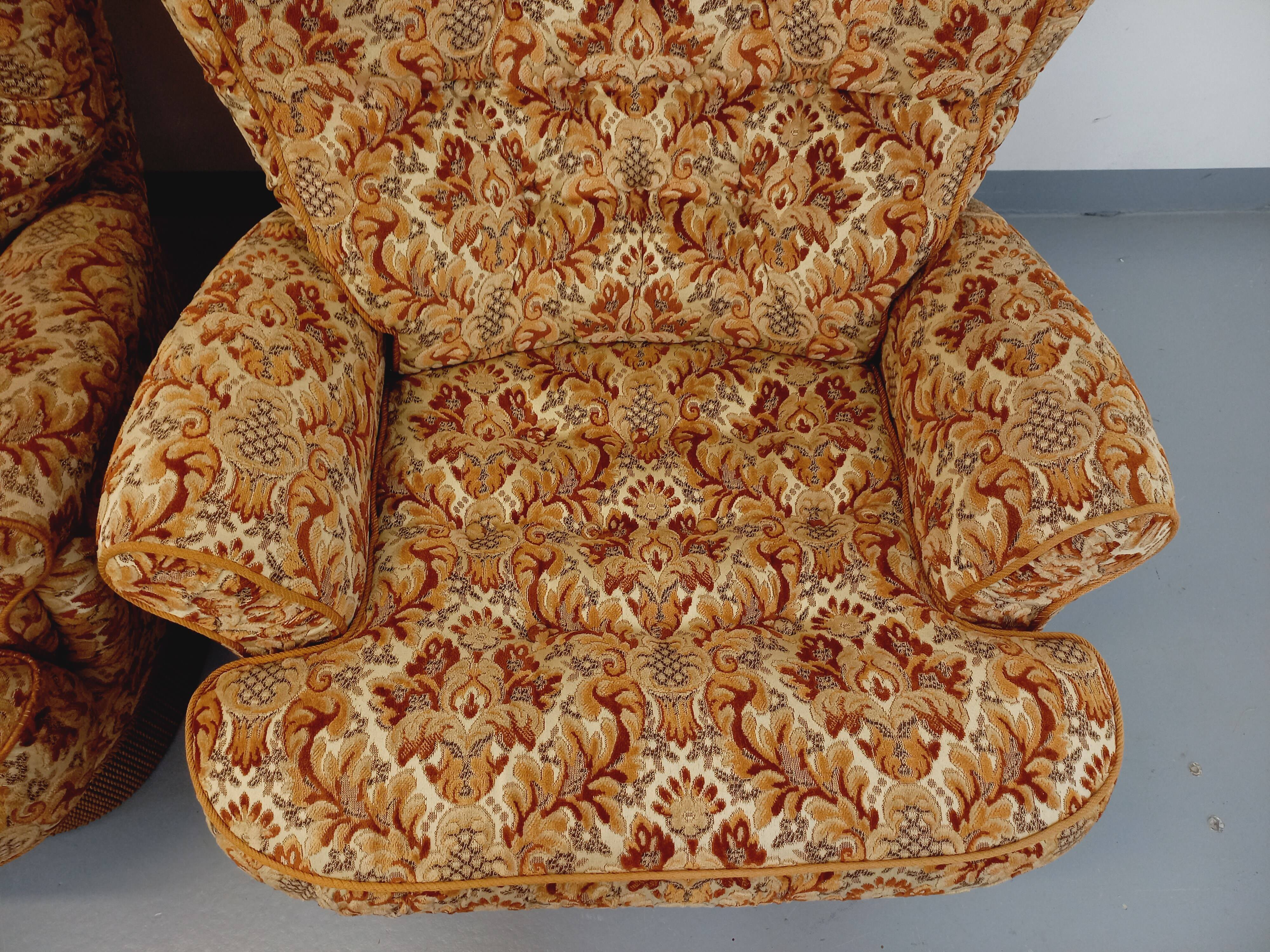 Set of 2 vintage armchairs in floral fabric with fringes from the 60s 70s