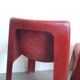 Pair of red fibreglass chairs from the 1970s.