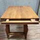 Table de salle a manger époque Art Déco en acajou blond vers 1950