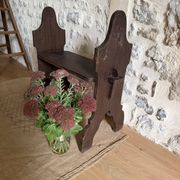 Small brutalist wooden bench