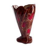 Ceramic vase, brown background, decorated with stylized tulips
