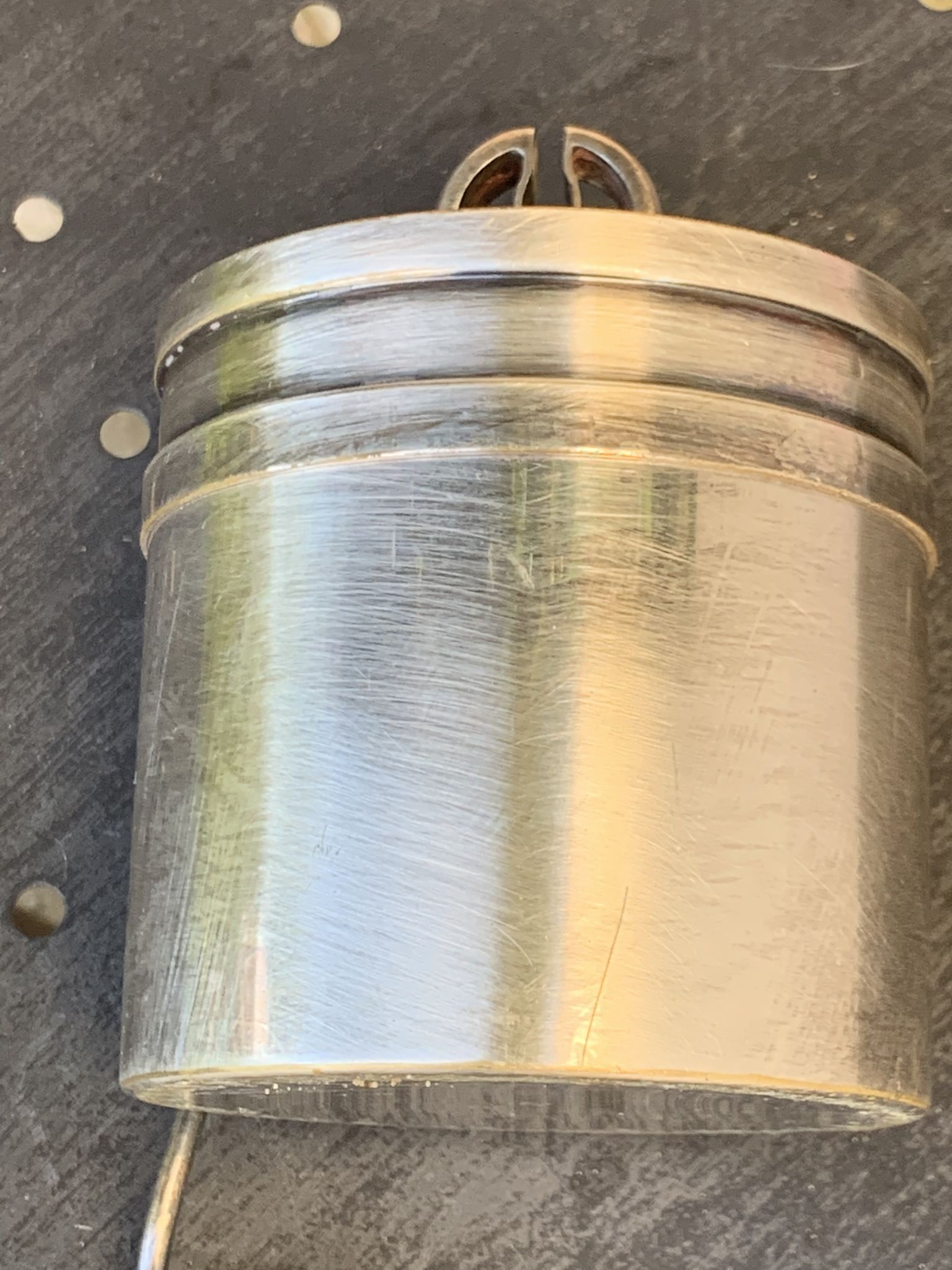 Sprinkling spoon and art deco sugar pot in silver metal