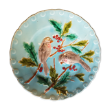 Assiette en barbotine à décor d'oiseaux