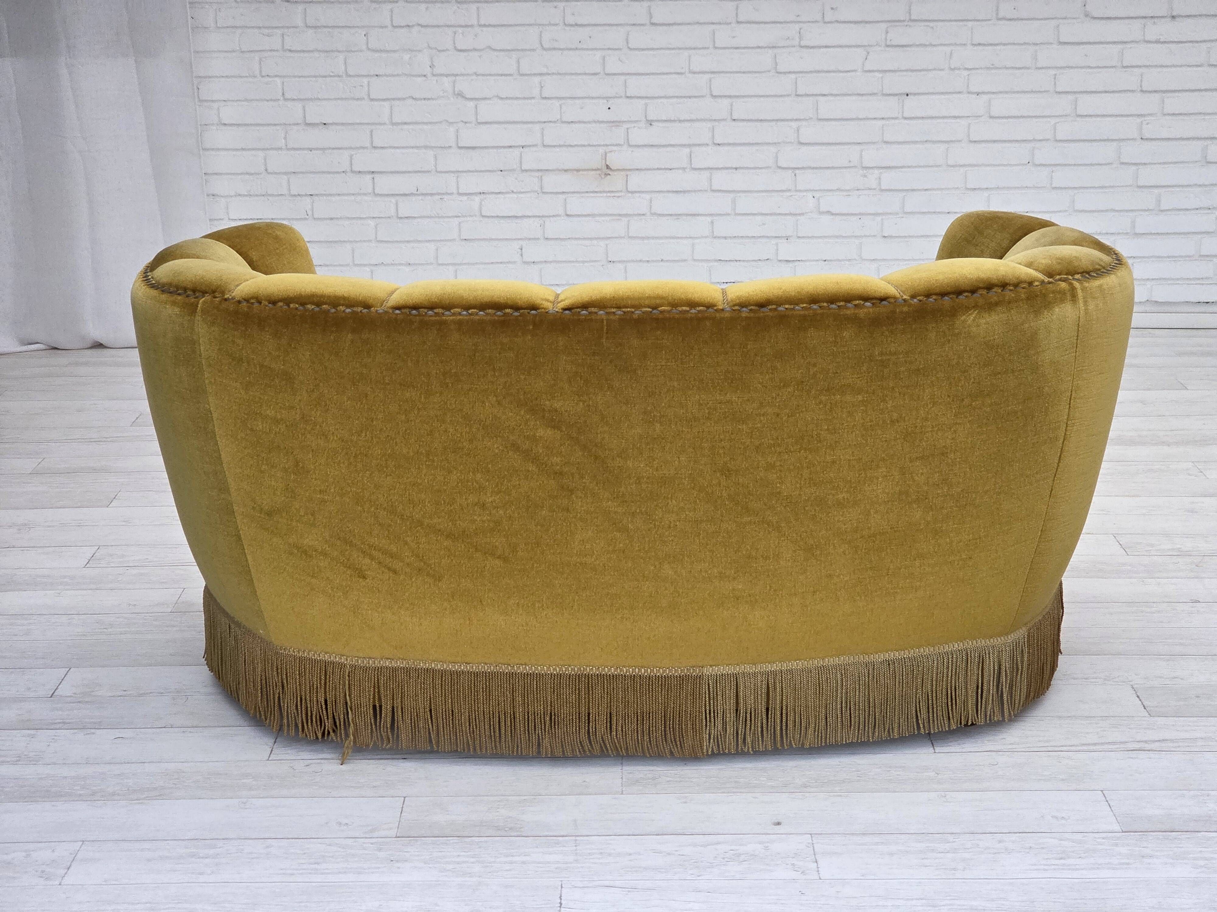 1960s, Danish 2-seater "Banan" sofa, green furniture velour, oak wood.