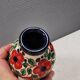 A mid-century vase with painted flowers. Portugal, 1950-60s. Majolica style