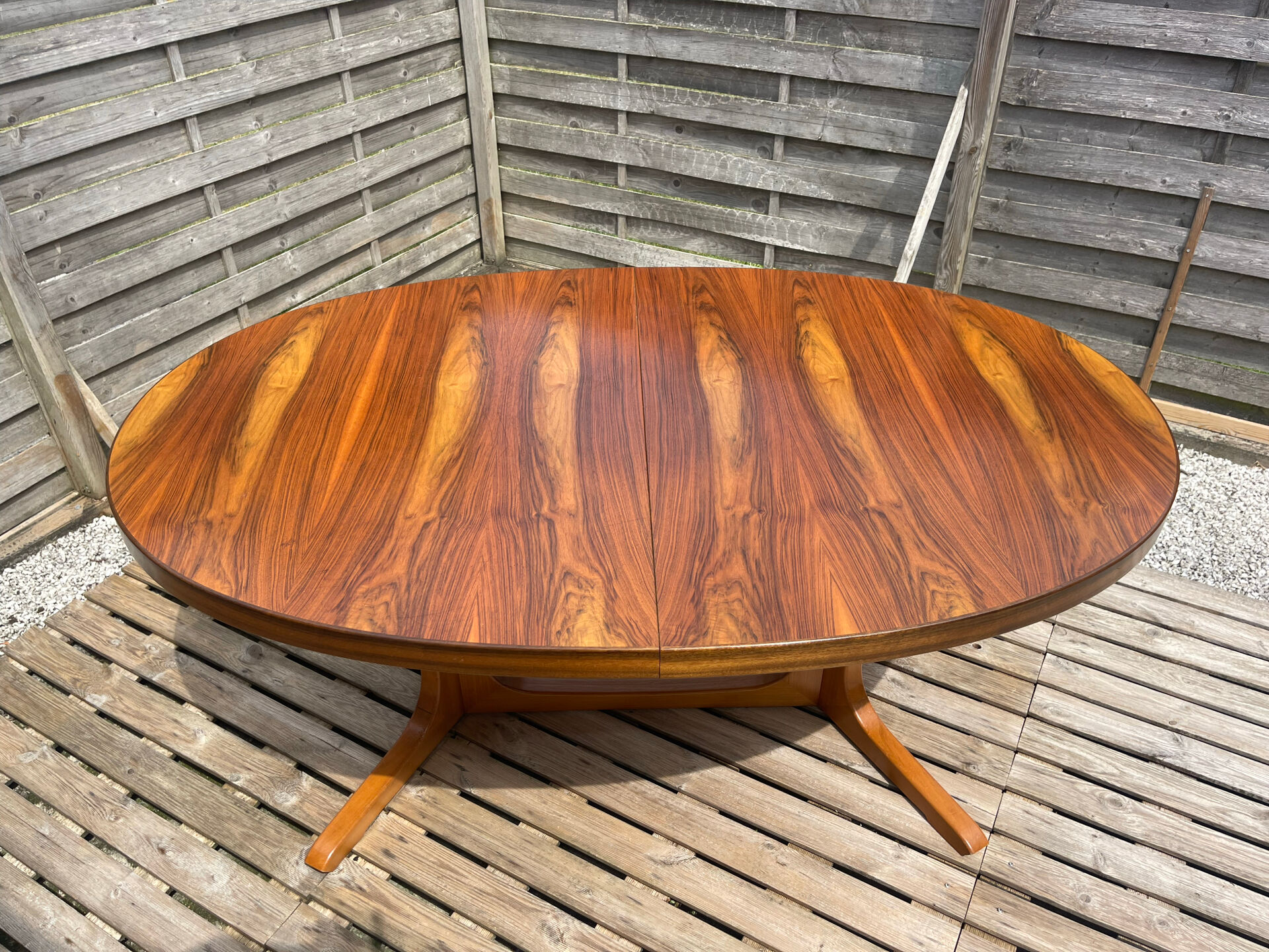 Oval table Baumann, two extensions, rosewood top.