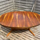Oval table Baumann, two extensions, rosewood top.