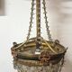 Antique balloon chandelier with pendants, in brass and with mouldings.