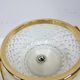 Transparent crystal basket with a gold-plated metal handle, Walther Glas, G