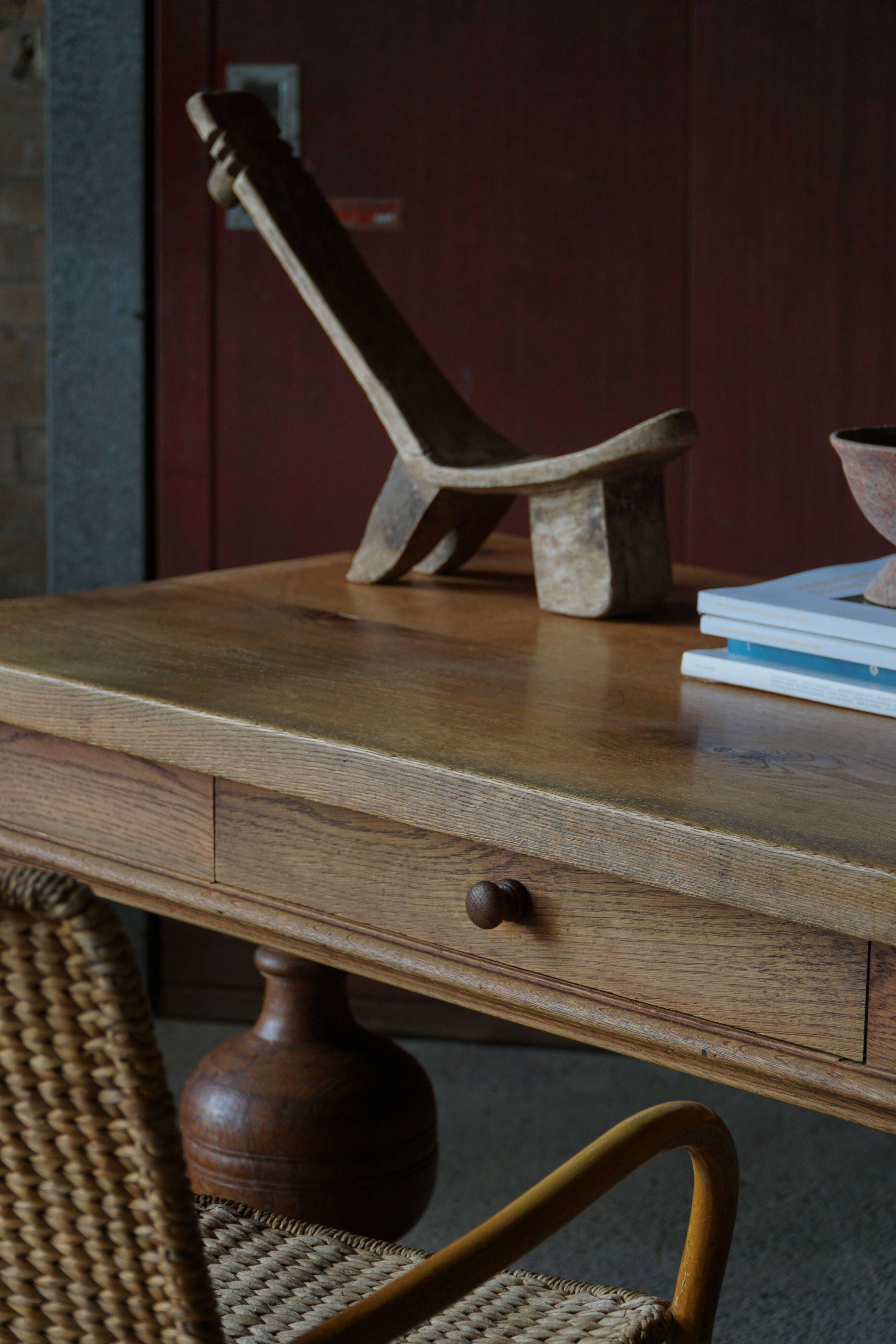 Baroque writing desk from the 1920s in solid oak, by a Danish cabinetmaker.