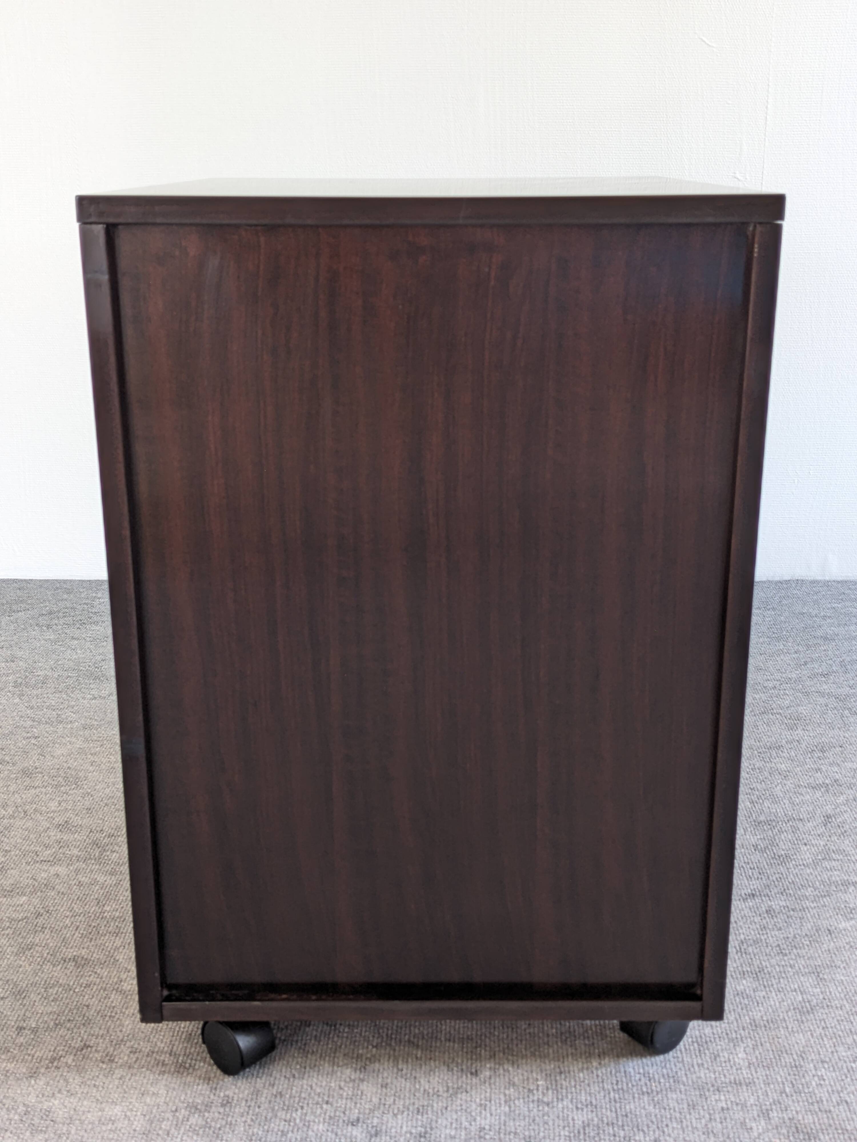 Rosewood storage box on wheels from the 70s/80s