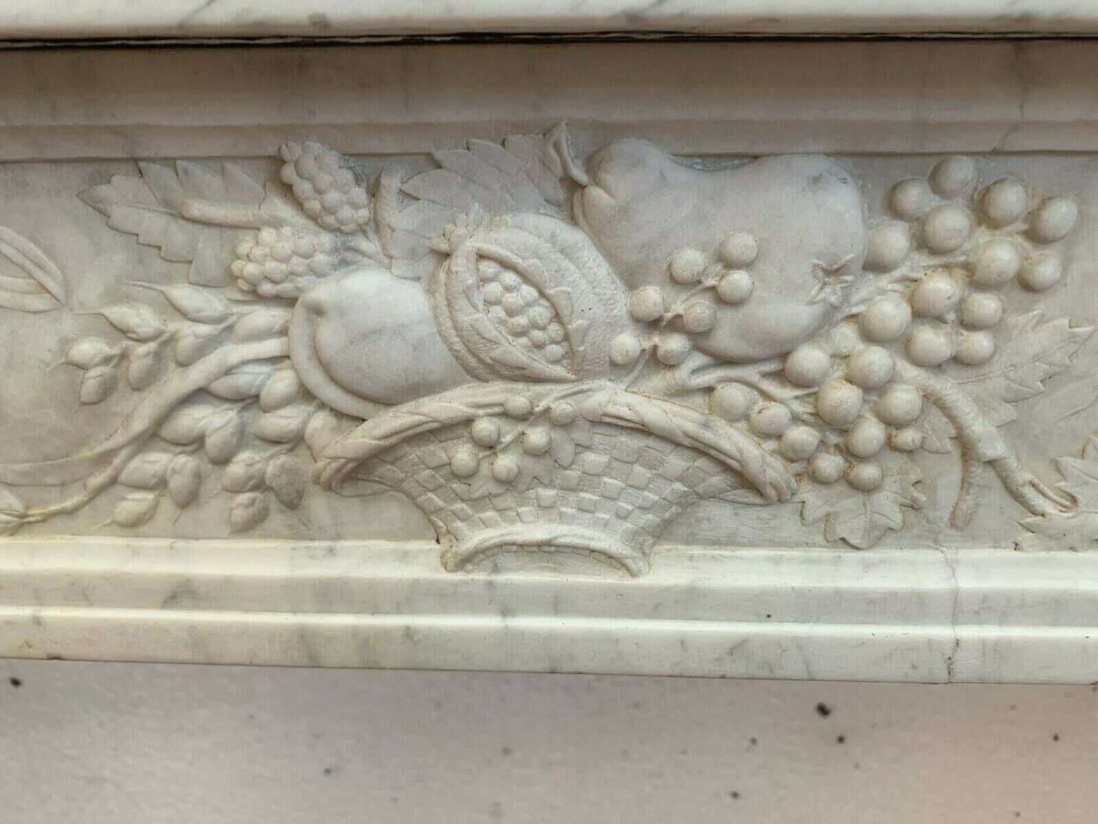 Louis XVI fireplace in 19th century white Carrara marble