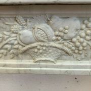 Louis XVI fireplace in 19th century white Carrara marble