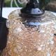 Suspended portable lamp