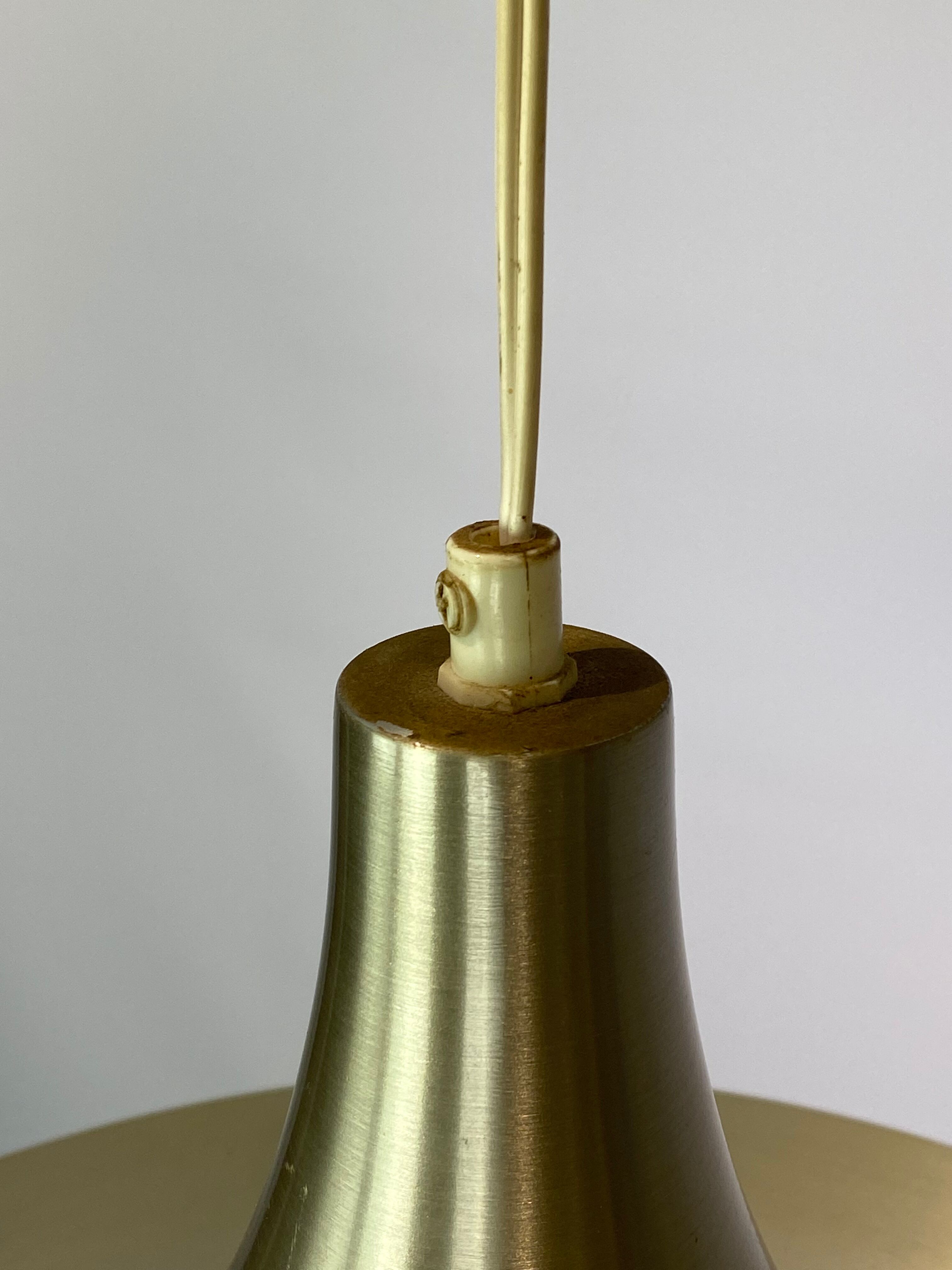 Gubi Semi pendant of brass designed by Claus Bonderup and Thorsten Thorup in 1968