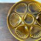 Set of 7 vintage khaki oyster plates