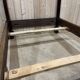 Louis XIII four-poster bed in walnut and poplar