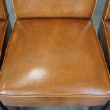 Set of 4 sheepskin dining chairs in light cognac color