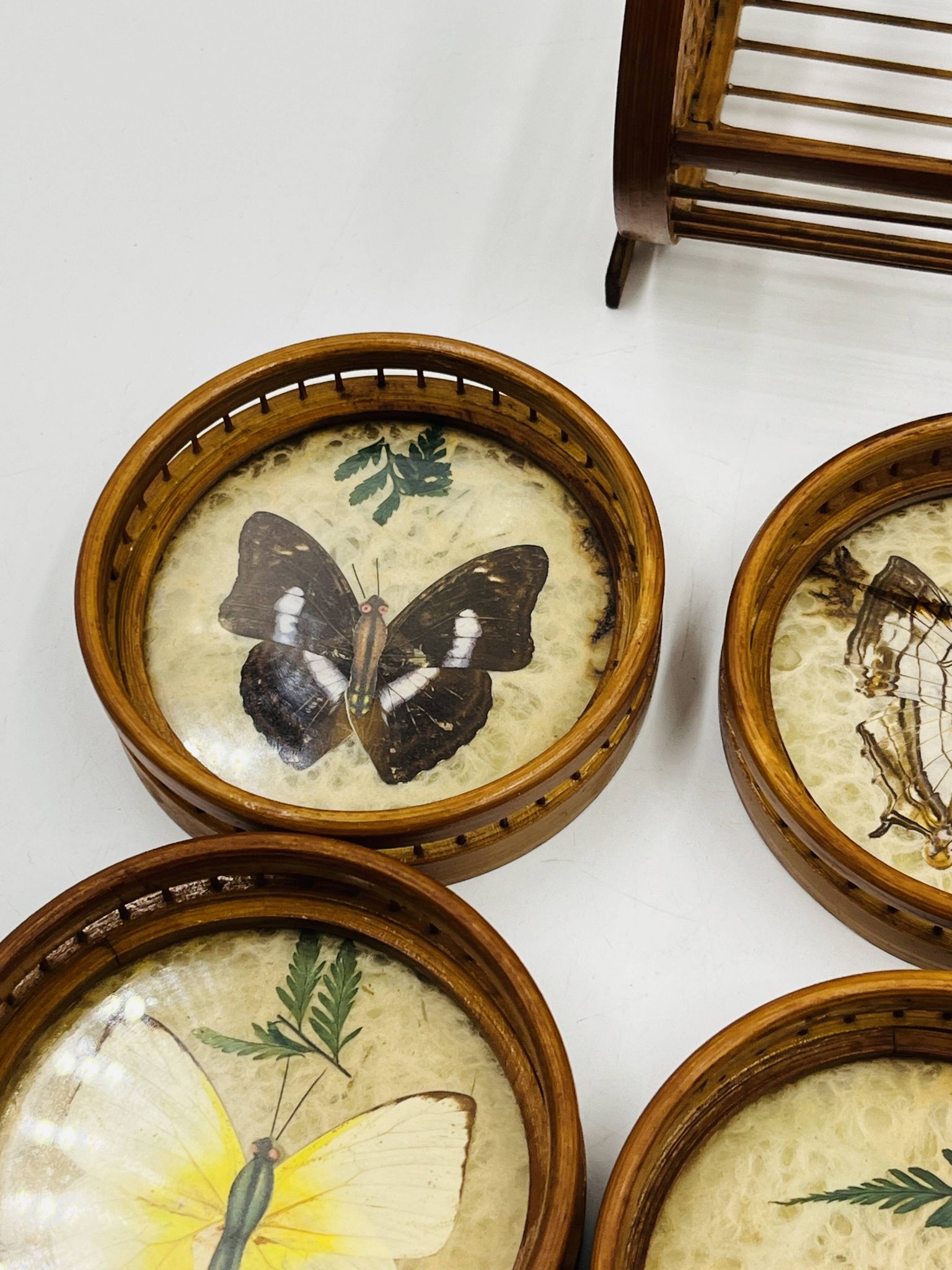 Vintage wooden coaster holder with 6 butterfly coasters.