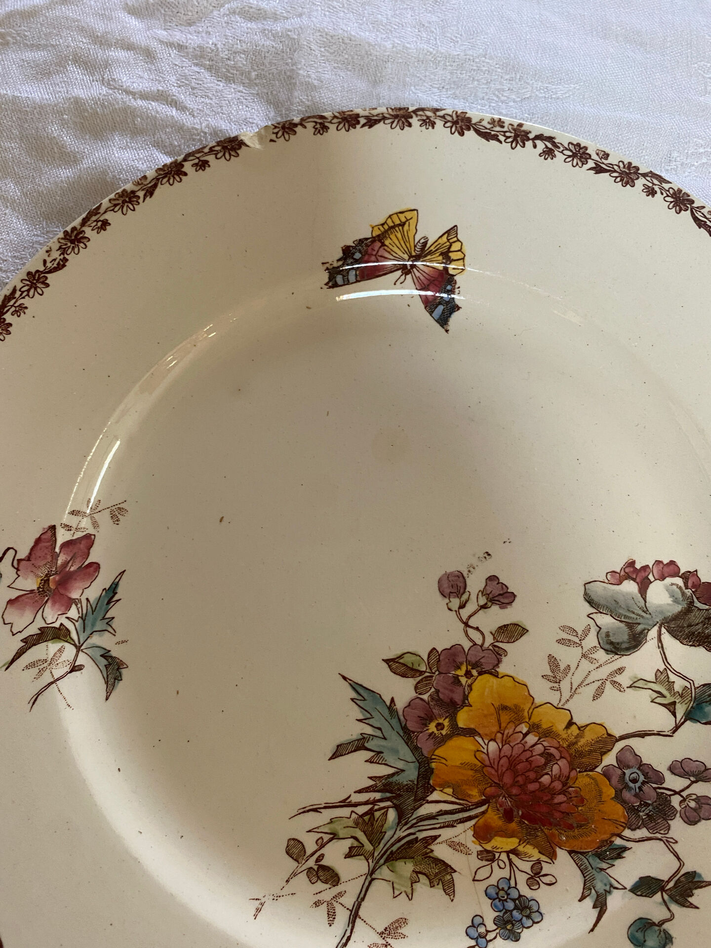 Set of 3 flat plates in polychrome ironstone E. Bourgeois