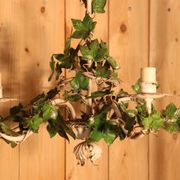 Antique metal chandelier with Art Nouveau floral decoration