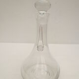 small glass decanter with its handle and spout