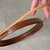 Mid Century solid teak wall mirror with a leather strap - Danish design