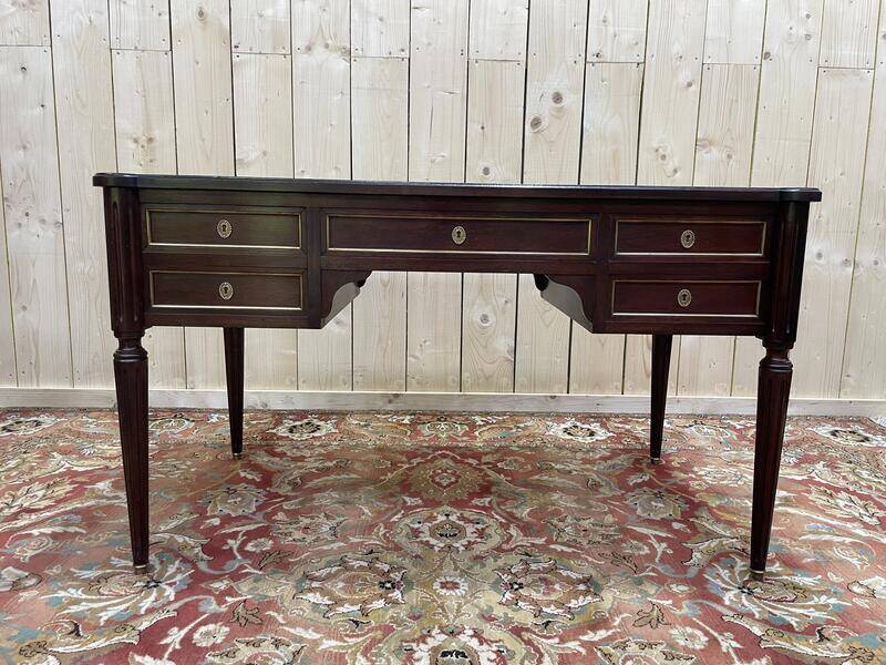 Bureau plat de style Louis XVI acajou et cuir rouge