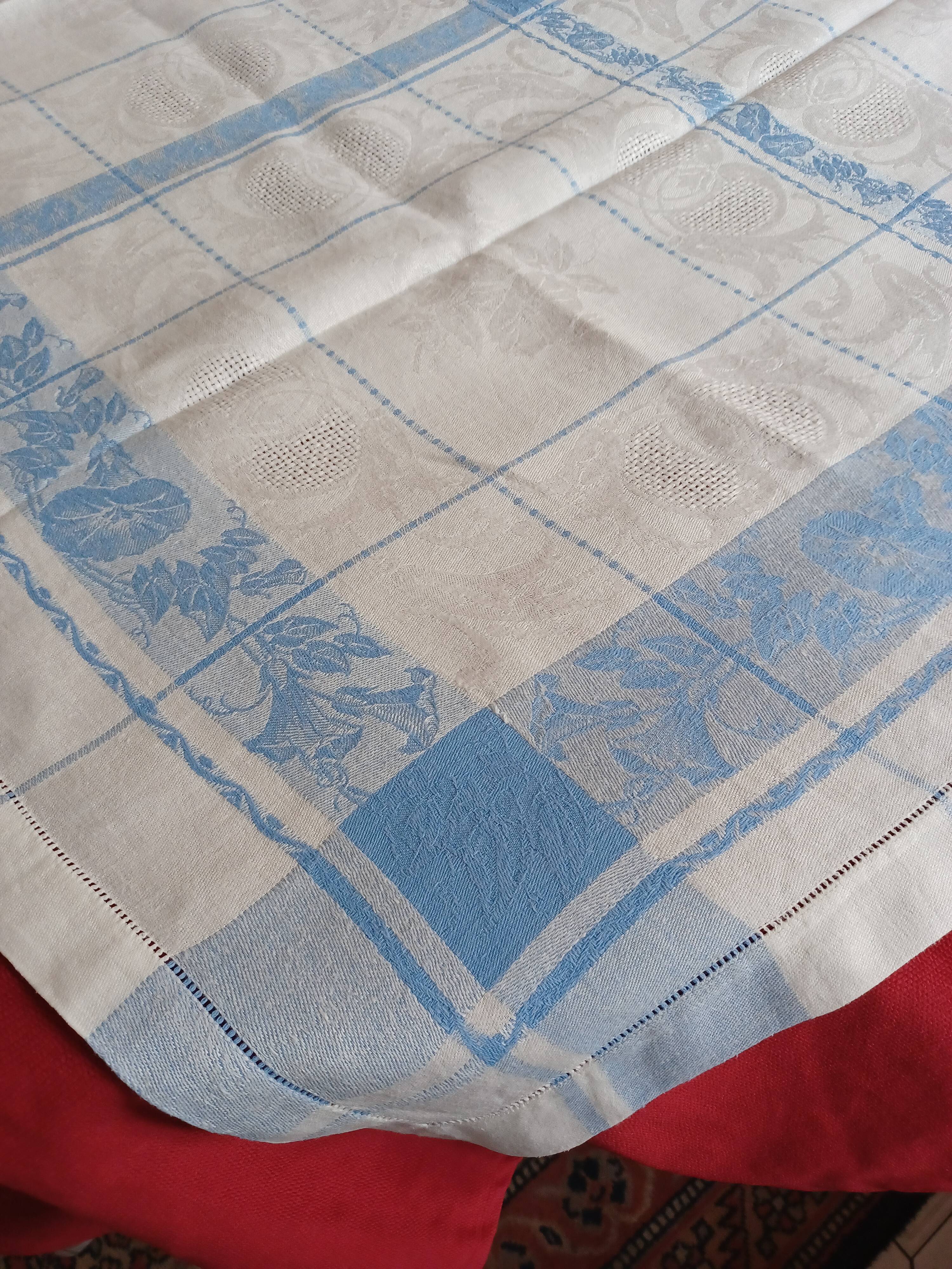 White and sky blue damask tablecloth and 10 towels