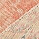 Tapis vintage oriental rouge et saumon