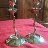 Pair of bronze candlesticks depicting a snake