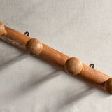 Varnished wooden wall coat rack with 4 hooks, antique item.