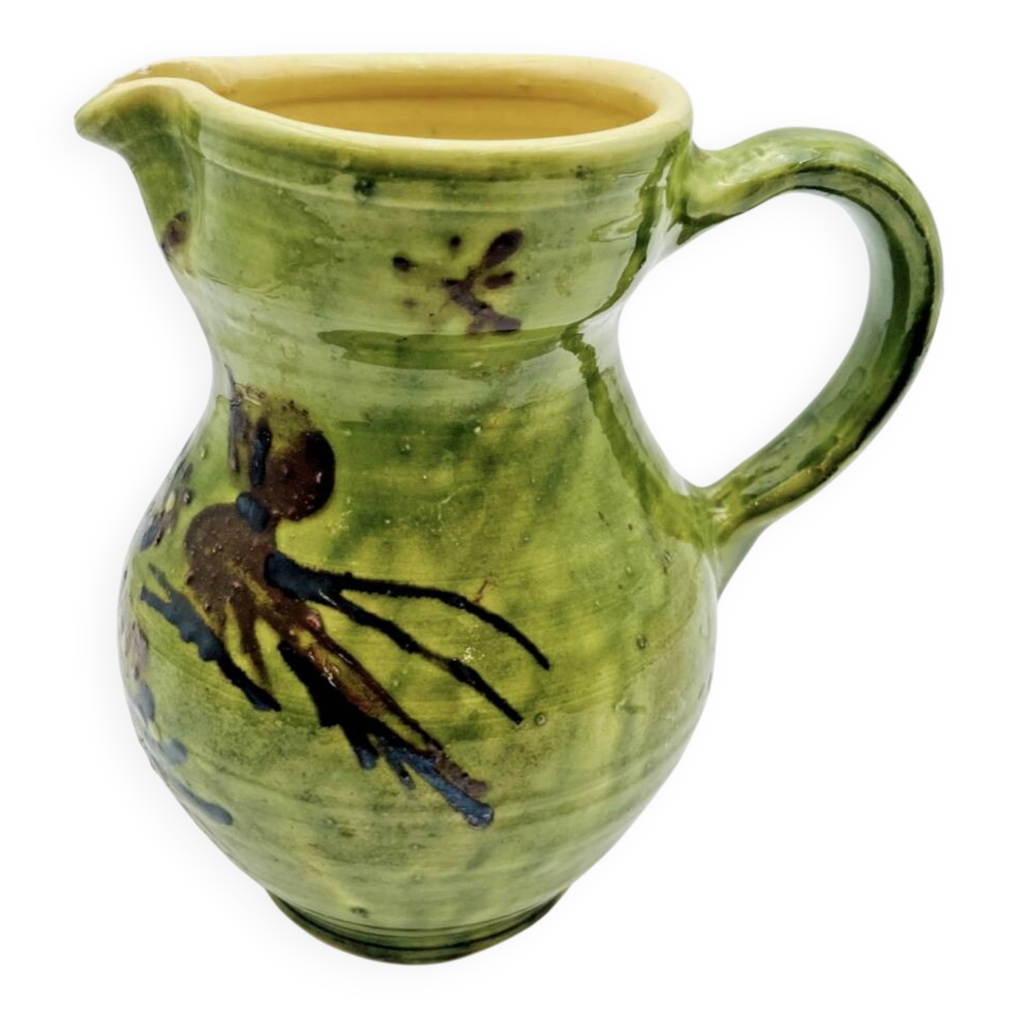 Green stoneware pitcher with flower and brown bird decoration