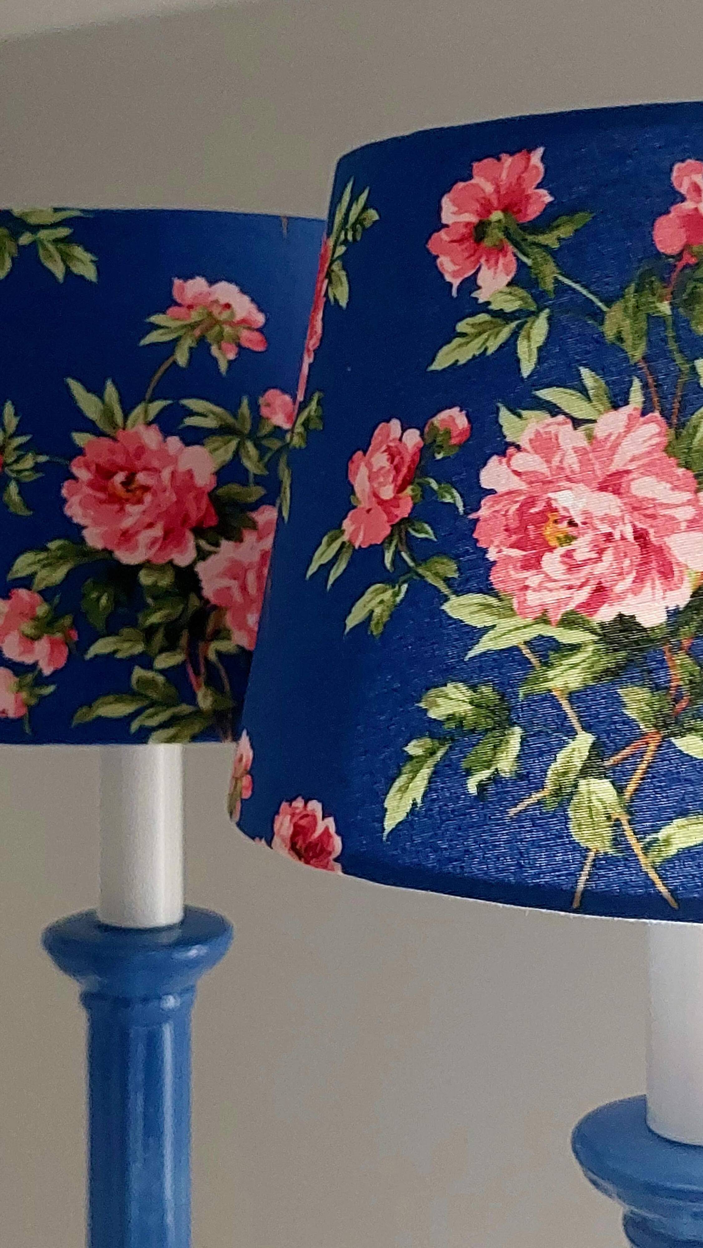 Pair of vintage blue ceramic lamps with Sanderson floral shades.