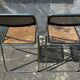 Pair of vintage metal caned folding chairs