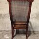 Rocking-chair en bois de cannage