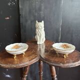Pair of tripod bowls in gilded Limoges porcelain.