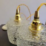 Trio of scrambled glass pendant lamps