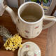 Old teapot or coffee maker in English style.