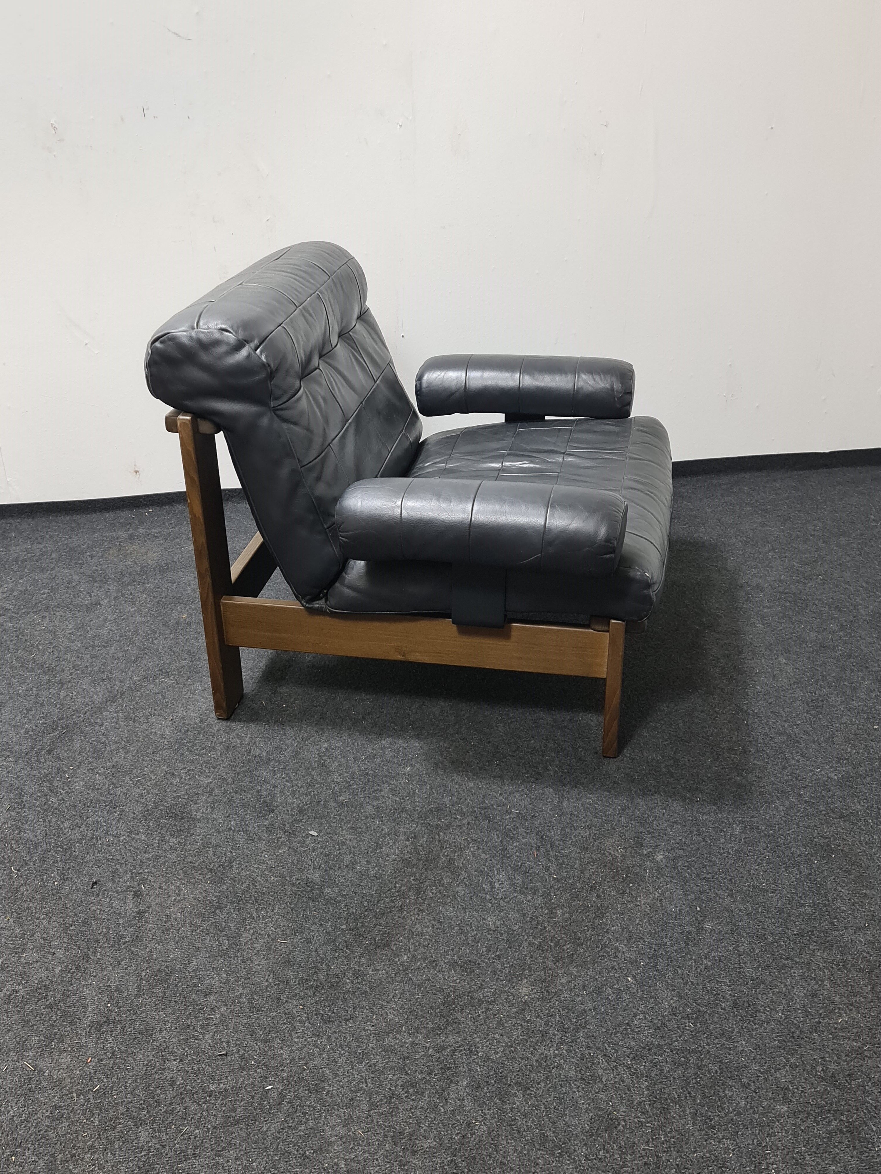 Vintage black leather patchwork and oak lounge chair