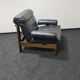 Vintage black leather patchwork and oak lounge chair