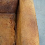 Charming 2-seater designer sofa made of sheep leather with a rustic look