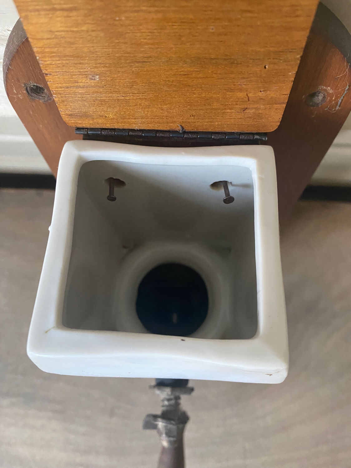 Old wall-mounted coffee grinder