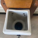 Old wall-mounted coffee grinder