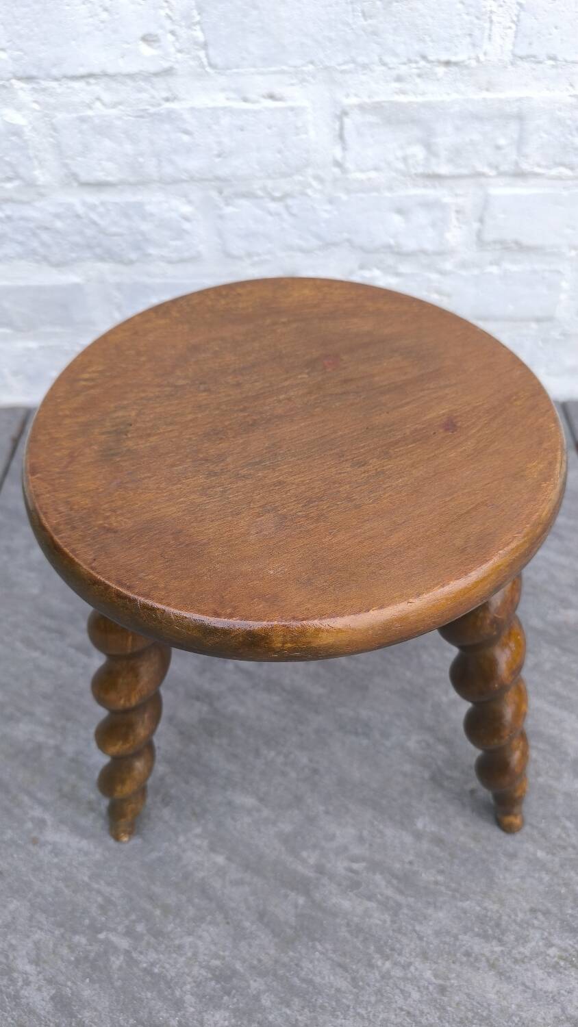 Turned wooden tripod stool