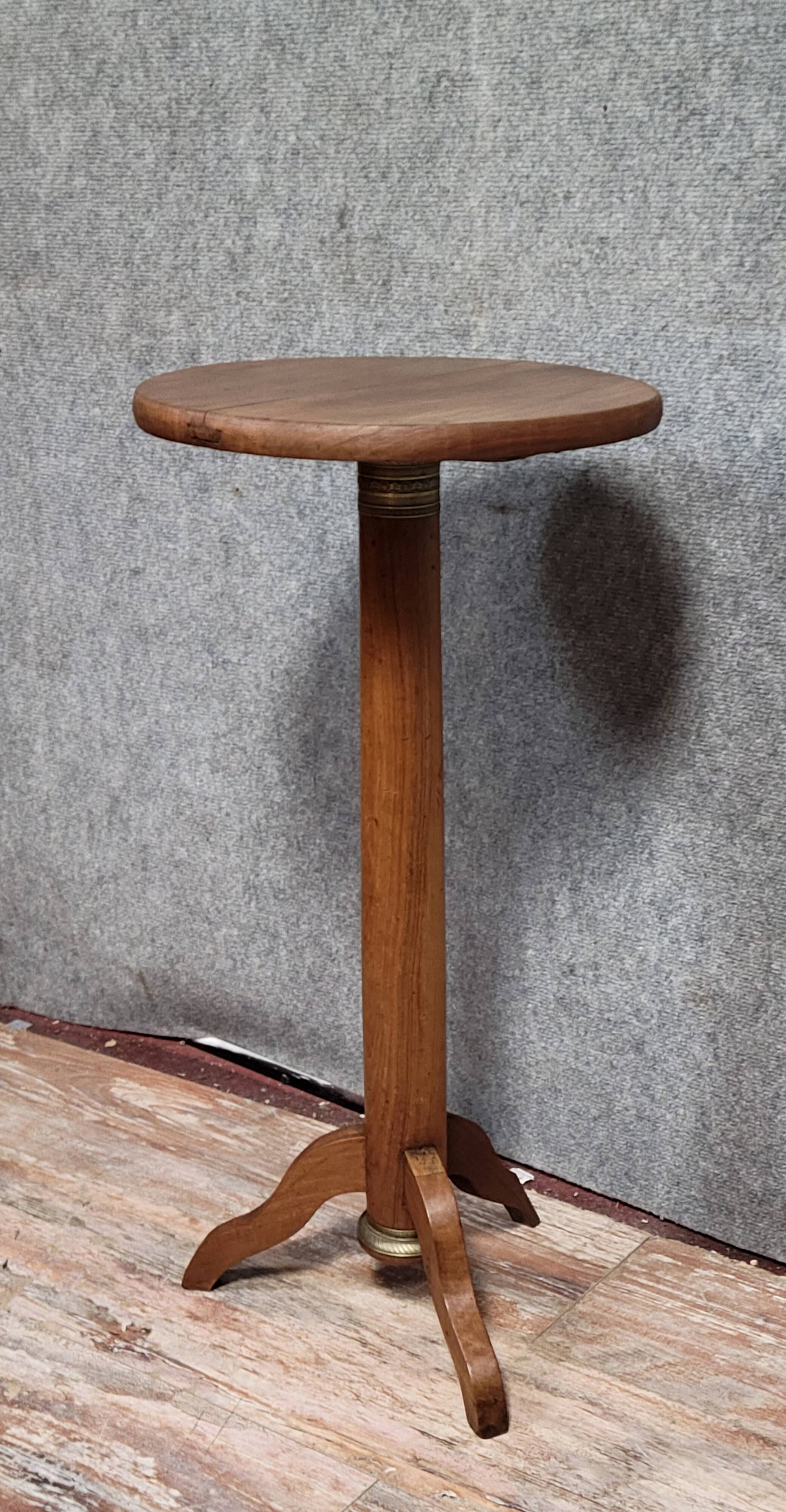 Empire period pedestal table in solid wood and gilt bronze